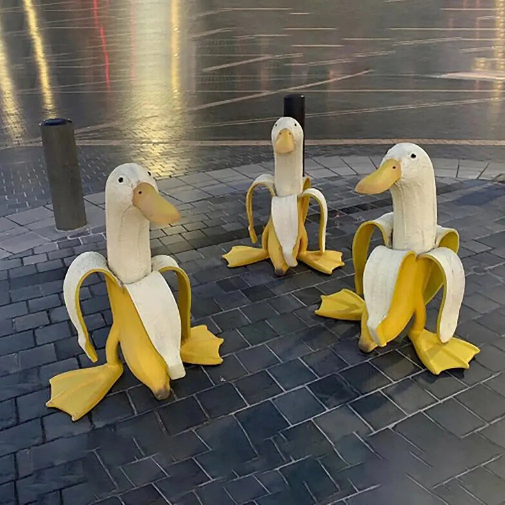 BananaDuck Skulptur "Quaki" | Lustige Gartendeko | Wetterfestes Kunstharz | 17 cm